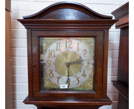 An early 20th century mahogany longcase clock with bevelled glass to pendulum door, the 8 day 3 chain movement chiming on 12 