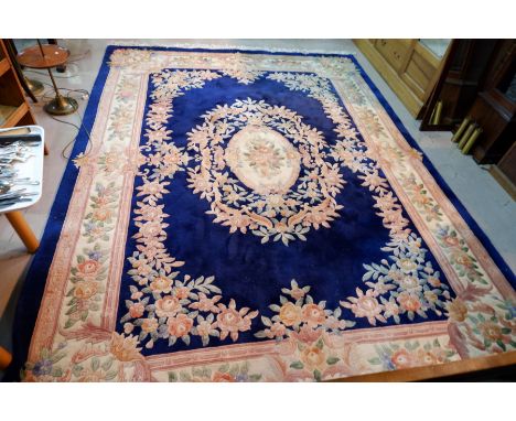 A Chinese large Aubusson pattern carpet with blue ground, 108" x 148"