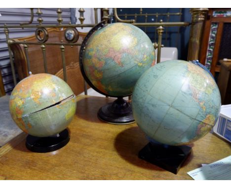 A large table globe and two smaller