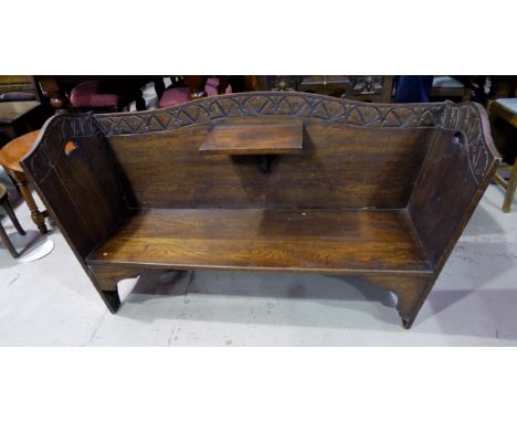 A 1930's elm bench with folding tray to the centre, 48"