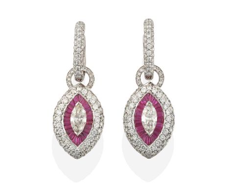 A Pair of Ruby and Diamond Cluster Drop Earrings, a round brilliant cut diamond set hinged hoop suspends a lozenge drop, the 