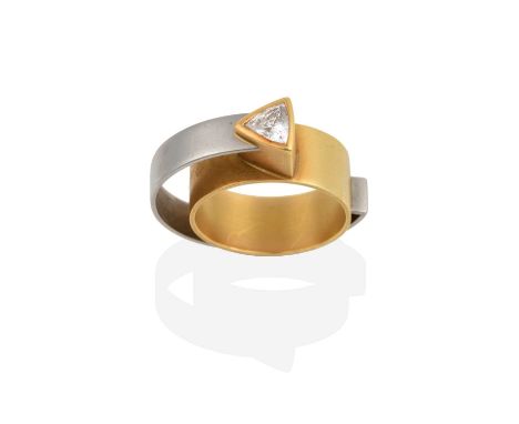 A Diamond Double Band Ring, by Ursula Scholz, of abstract design, the matte yellow band with a raised brilliant cut diamond i