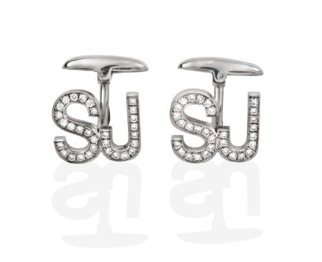 A Pair of Diamond Cufflinks, the initials 'SJ' set throughout with eight-cut diamonds in white claw and channel settings, tot