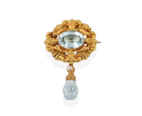 An Aquamarine and Split Pearl Brooch, the oval cut aquamarine in a yellow claw setting within a scroll and leaf motif border,