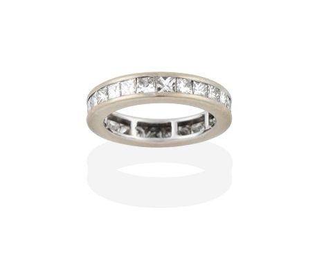 An 18 Carat White Gold Diamond Eternity Ring, the twenty-six princess cut diamonds in a channel setting, total estimated diam