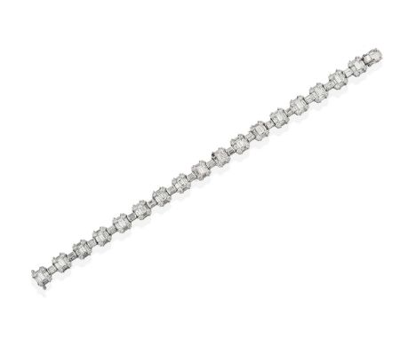 An 18 Carat White Gold Diamond Bracelet, seventeen square shaped clusters formed of baguette cut and round brilliant cut diam