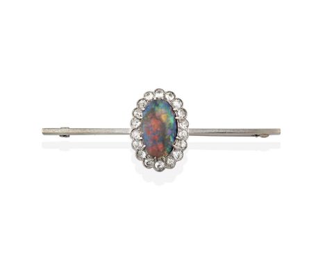 An Opal and Diamond Bar Brooch, the oval cabochon opal in a white claw setting, within a border of old cut diamonds in milleg