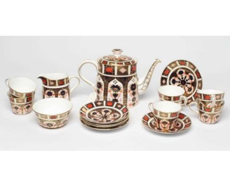 A ROYAL CROWN DERBY CHINA TEA SET, modern, painted in the Imari palette with pattern 1128, comprising tea pot and cover, 10 1