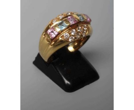 A DIAMOND AND MULTI-GEM COCKTAIL RING, the domed panel centred by a row of coloured stones with wide bands between and within