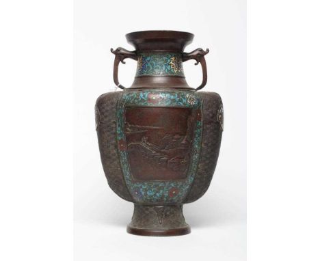 A CHINESE CLOISONNE ENAMEL VASE of two handled ovoid form, cast with panels of figures in landscapes within cloisonne borders