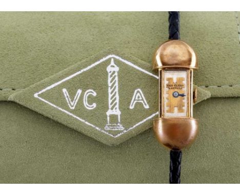 A LADY'S ART DECO VAN CLEEF &amp; ARPELS 18CT GOLD WRISTWATCH, the oblong polished silvered dial with a gilt metal key cut ap