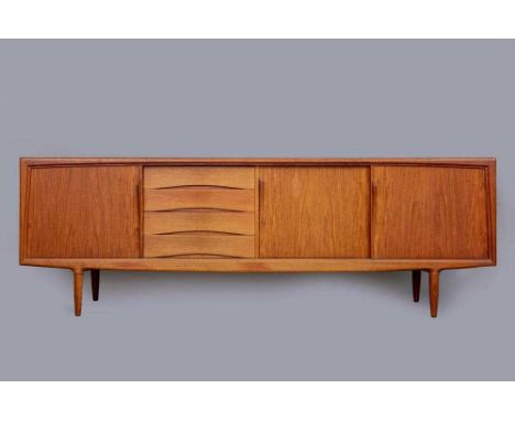 A GUNNI OMANN FOR AXEL CHRISTENSEN DANISH TEAK SIDEBOARD, mid 20th century, comprising an inset bank of four baize lined draw