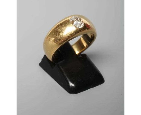 A GENTLEMAN'S SOLITAIRE DIAMOND RING, the Victorian cushion cut stone of approximately 0.70cts, gypsy set to a plain wide sha