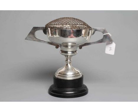 AN ART DECO SILVER TWO HANDLED TROPHY CUP, by Joseph Gloster Ltd., Birmingham 1924, the circular ogee bowl with two angular h