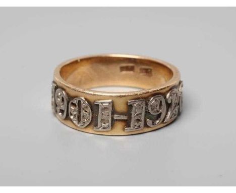 A SILVER WEDDING ANNIVERSARY DIAMOND HALF HOOP BAND, the wide yellow band inset with the date 1901-1926 and point set with sm
