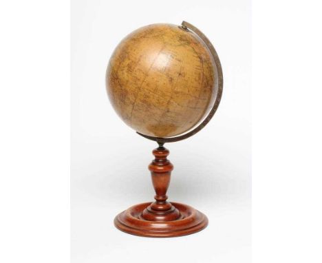 A PHILIP’S 10" TERRESTRIAL TABLE GLOBE, early 20th century, raised on turned fruitwood stand (Est. plus 24% premium inc. VAT)