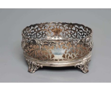 A VICTORIAN SILVER CRUET BASE, possibly by George Richards, London 1855, of bombe oval form, the cast and applied scroll rim 