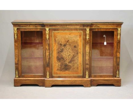 A VICTORIAN BURR WALNUT AND EBONISED CREDENZA of breakfront form with marquetry scrollwork, stringing and gilt metal mounts, 
