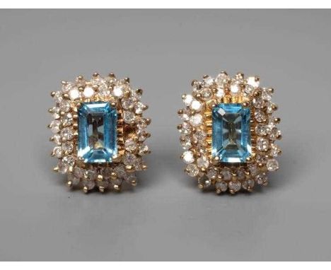 A PAIR OF BLUE TOPAZ AND DIAMOND CLUSTER EAR STUDS, of stepped oblong form, on 9ct gold posts, Birmingham probably 2005, spon