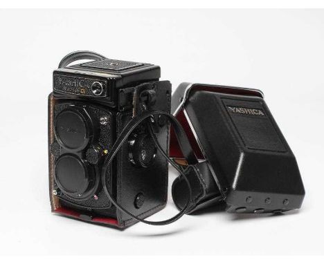 A YASHICA Mat-124 G CAMERA, with top viewer, twin Yashinon lenses, 1:2.8 f = 80mm and 1:35 f=80mm, with leather case (Est. pl
