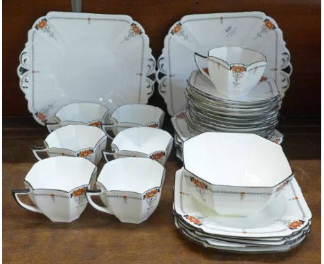 A 1920s Shelley tea set, seven cups, one a/f, twelve saucers, eleven side plates, a bowl and two sandwich plates 