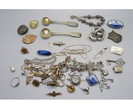 A collection of silver jewellery, silver scout badge, plated locket, etc. 