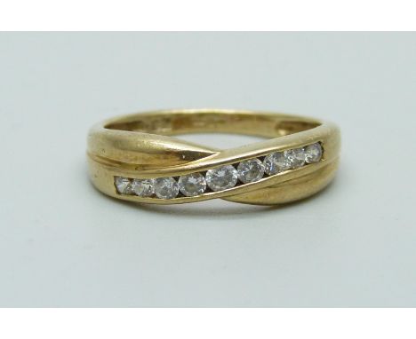A 9ct yellow gold and white stone crossover ring, M, 1.9g 