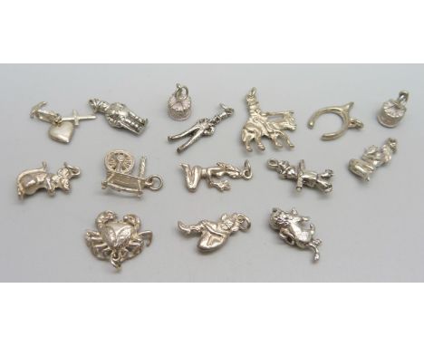 Fifteen silver and white metal charms, 31g 