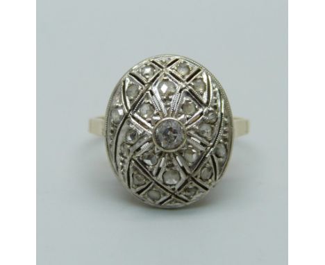 An early 20th century yellow metal and old cut diamond ring, P, 4.3g 
