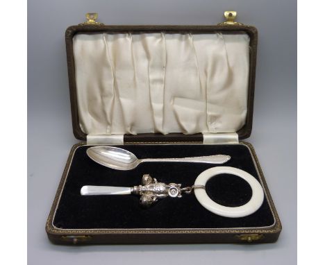 A hallmarked silver Christening set, owl rattle and spoon, spoon 24g and 137mm 