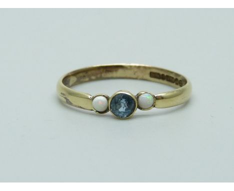 A 9ct yellow gold opal and topaz ring, P, 1.5g 