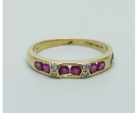 An 18ct yellow gold ruby and diamond ring O, 2.9g 