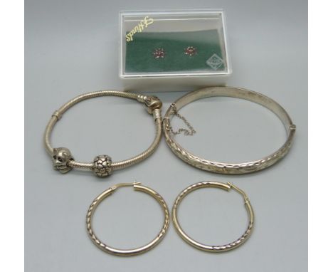A pair of 9ct gold and garnet earrings, Pandora bracelet with two charms, silver bangle, etc. 