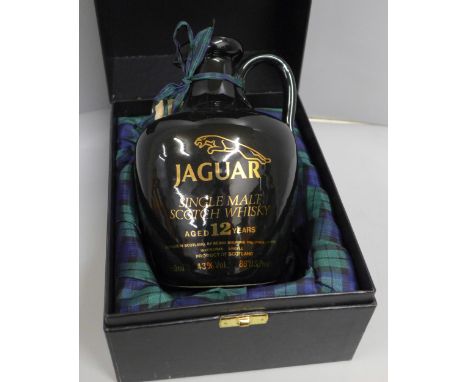A Jaguar (motor company) presentation single malt Scotch whisky decanter, boxed and sealed 