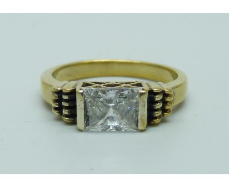A silver gilt and simulated diamond ring, R 