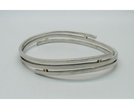 A silver and diamond bangle, 27.5g 