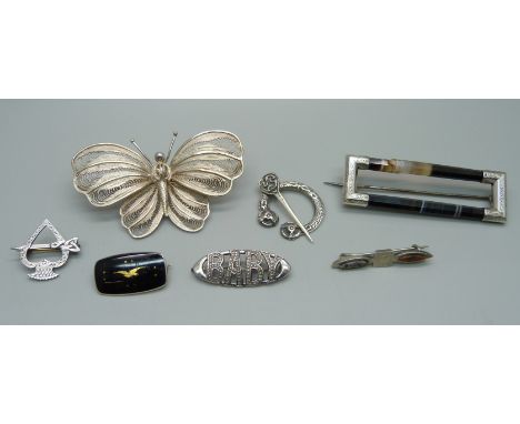 Seven silver brooches, four marked silver, others test as silver, 45g 