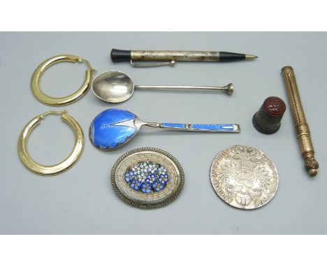 Assorted items including two enamelled silver spoons, a Maria Theresa 1780 silver coin, white metal and carnelian thimble, et