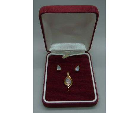A pair of 18ct yellow  gold and opal earrings and an 18ct gold, opal and diamond pendant, 4.7g total weight 