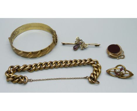 Victorian and later jewellery including a bracelet, bangle, two brooches and a swivel fob 