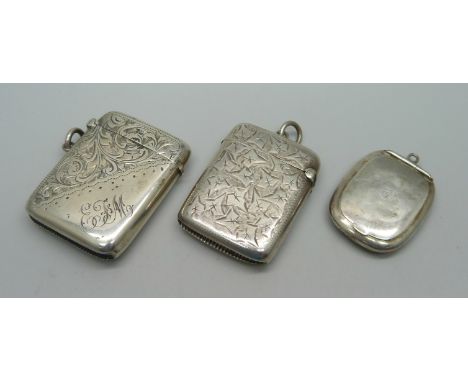 Two silver vesta cases and a silver pill box, 56g 