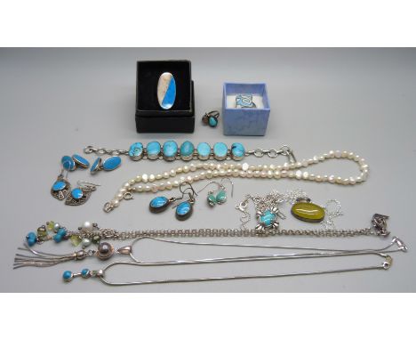 A collection of silver and white metal jewellery to include turquoise and pearl 