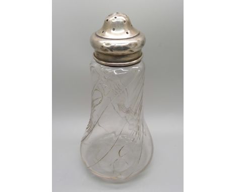 A silver topped glass sugar shaker 