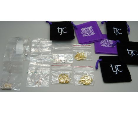 Six silver pendants and chains 