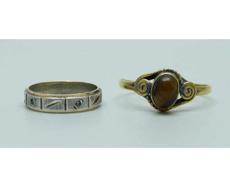 A 9ct gold and silver eternity ring, M, and a gilt metal tigers eye ring, Z 