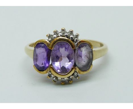 A 9ct yellow gold amethyst and diamond ring, P, 2.5g 