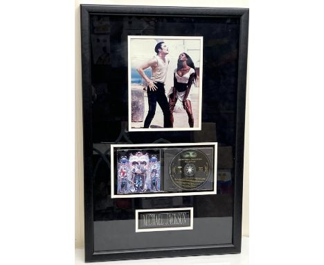 Michael Jackson framed 'Dangerous' CD and signed photo of Michael Jackson, 45.4cm x 69.8cm, with Certificate of Authenticity 