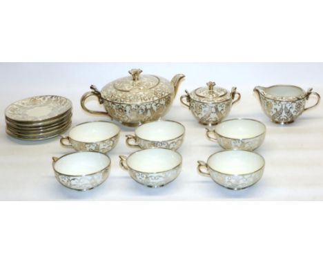 Bavarian type porcelain tea ware with silver overlay, comprising teapot, H11cm, six cups and saucers, milk jug and sugar bowl