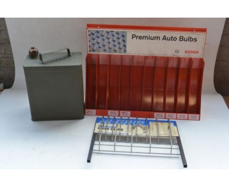 Military oil can with cap, dated 1942 with broad arrow, and Bosch Premium Auto Bulbs and Hi-Grip hose clips shop display stan