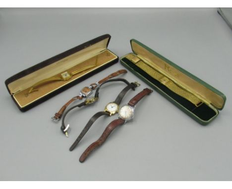 Ladies Royce gold plated hand wound wristwatch on integrated bracelet in original box, ladies gold plated hand wound wristwat